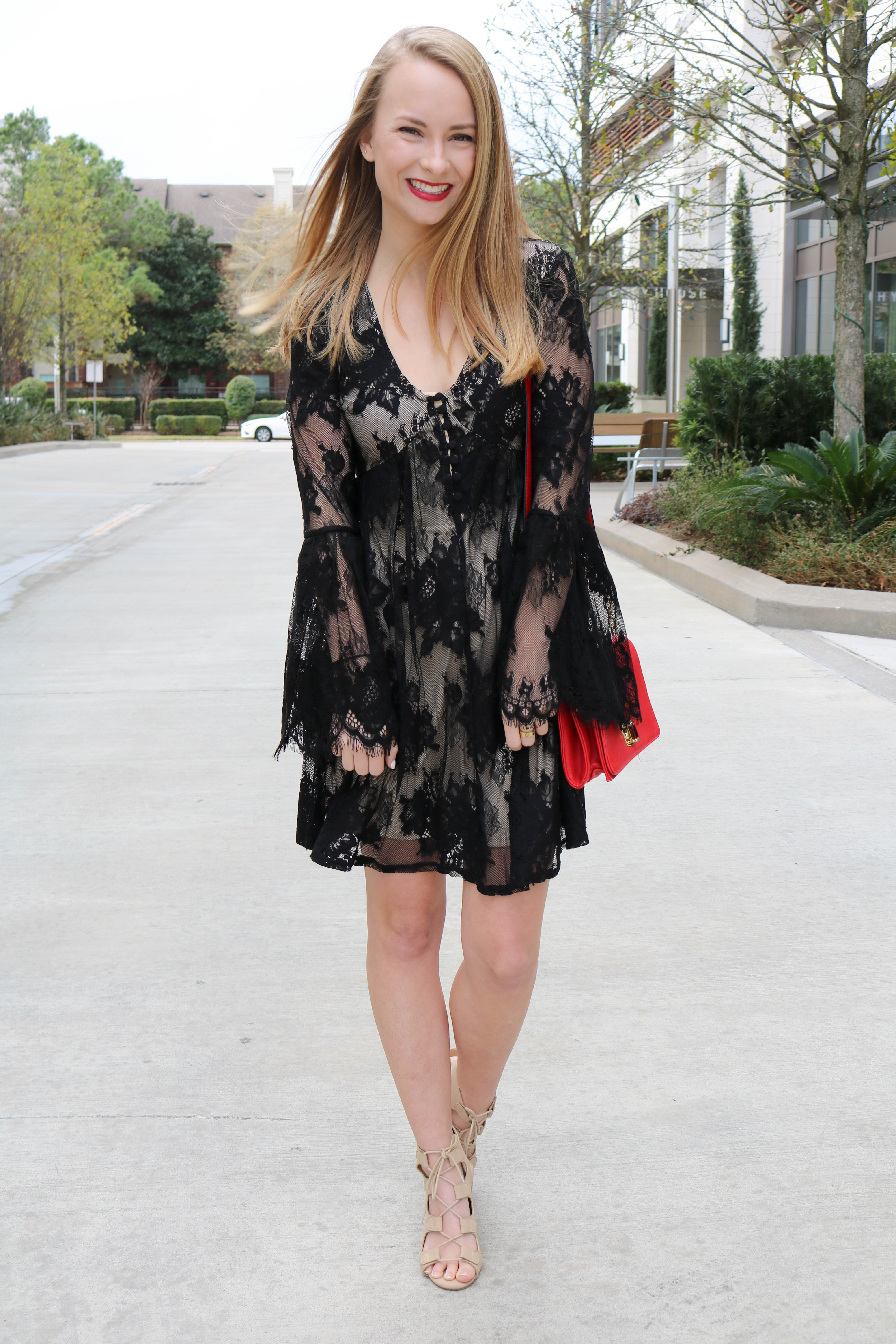 Valentines Lace Dress | Under $30 + these gorgeous lace belle sleeves. The perfect dress for your Valentine's date night! Click through to shop it. 